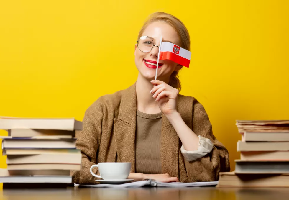 blonde-woman-with-flag-poland-books-yellow