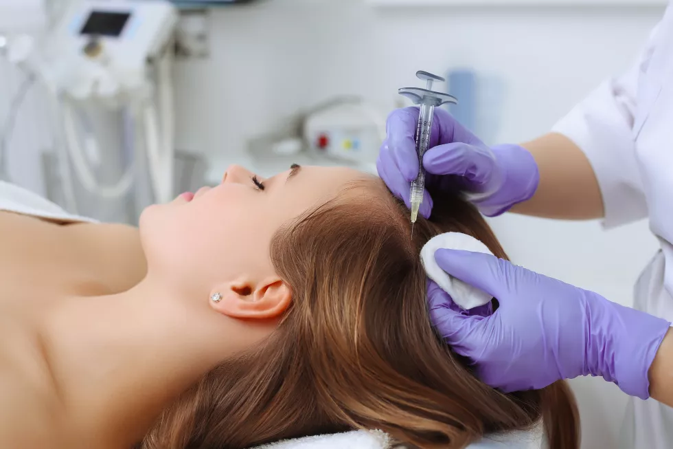 female-makes-injection-vitamins-minerals-scalp