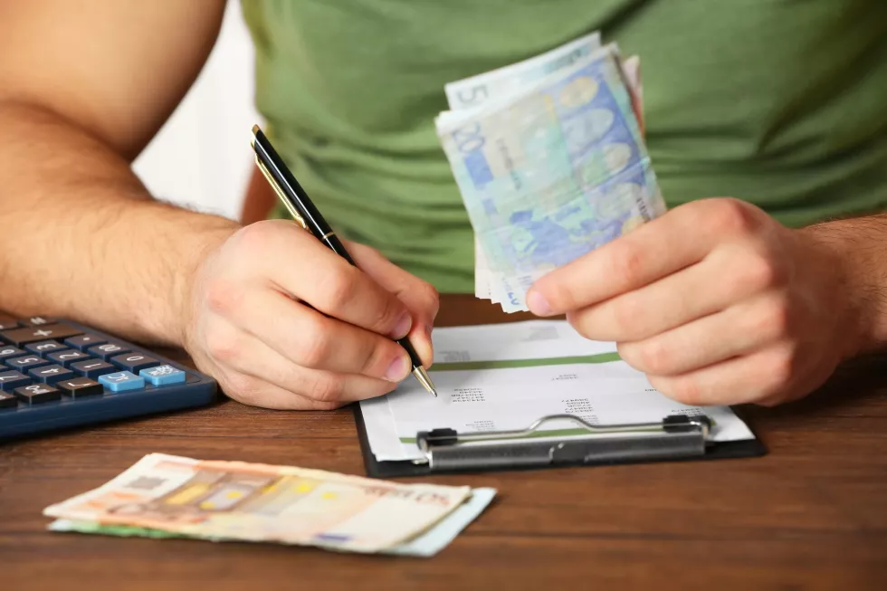 man-working-financial-report-office-closeup