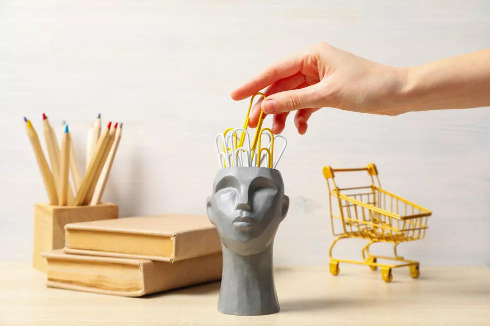 drawing-concept-with-decorative-head-wooden-table