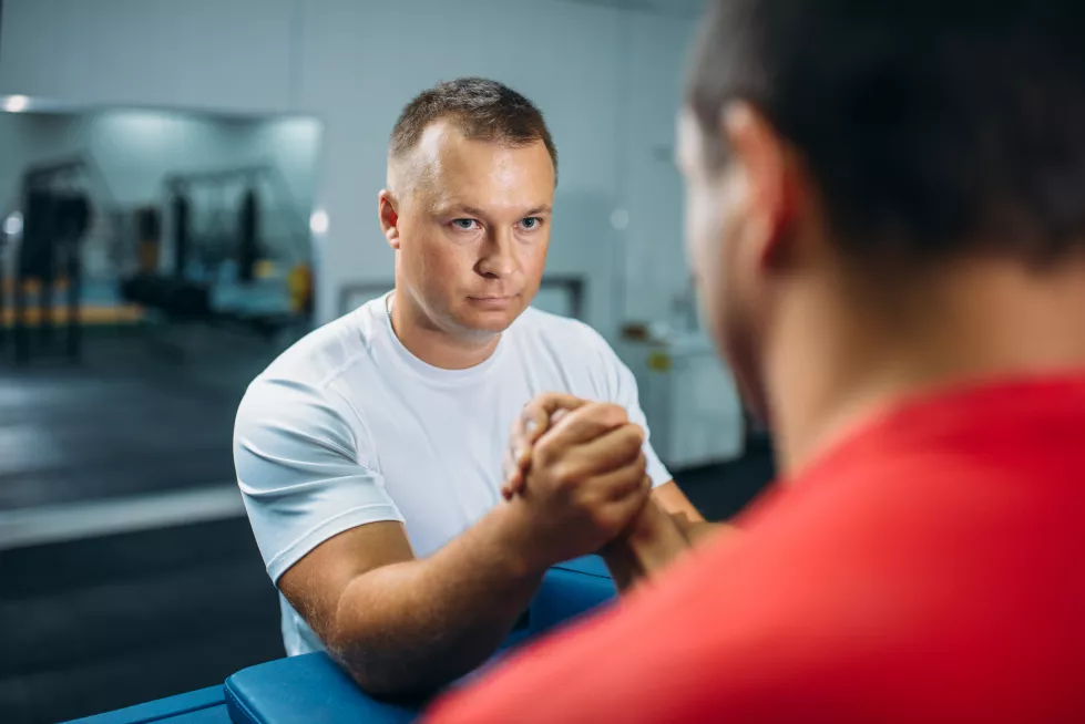 two-arm-wrestlers-table-with-pins-training